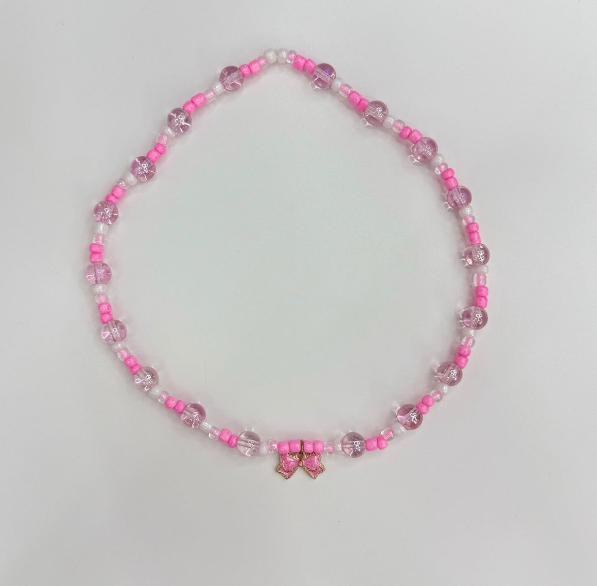 Light pink bow necklace