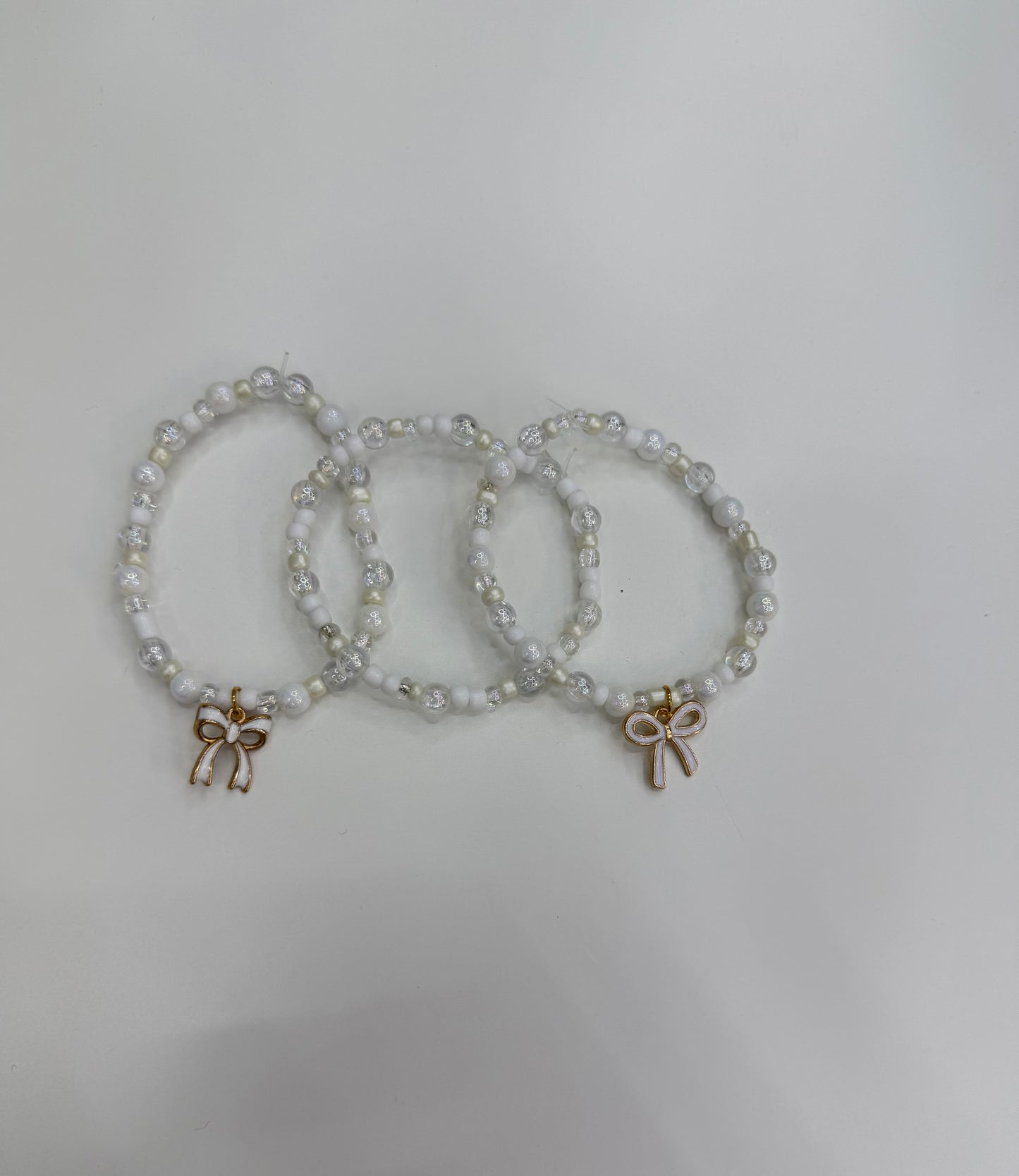 White bow braclet set